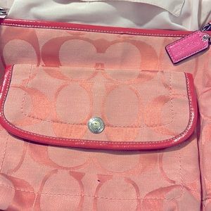 This is a vintage Coach crossbody bag.